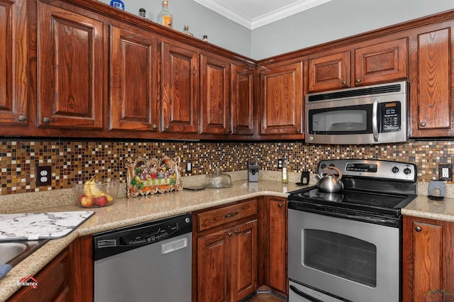 kitchen featuring sink, light stone counters, crown molding, decorative backsplash, and appliances with stainless steel finishes