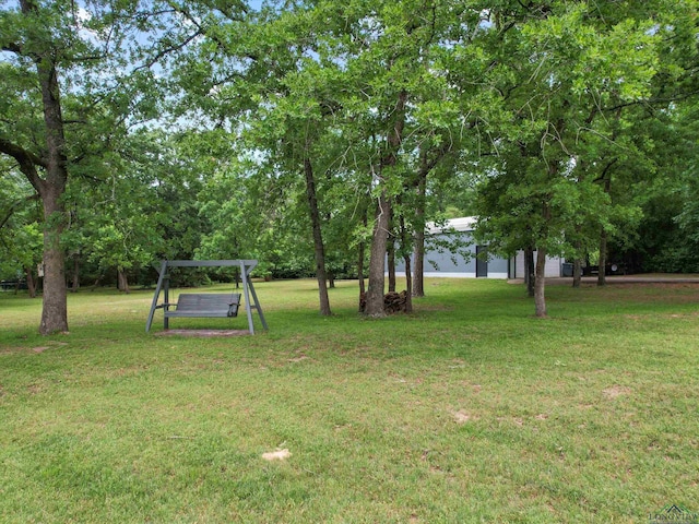 view of yard with a garage