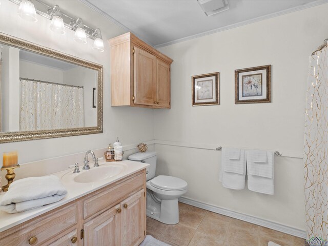 full bath with crown molding, tile patterned floors, toilet, and vanity
