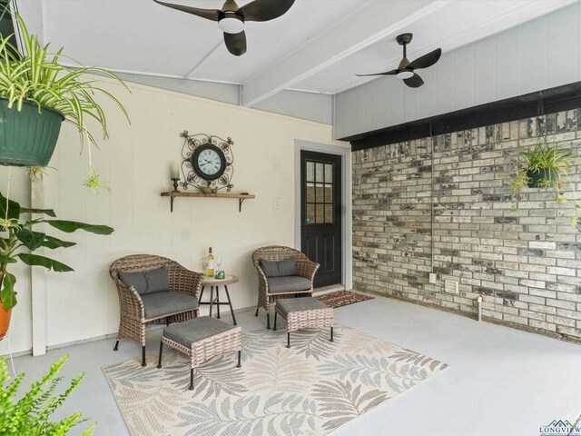 view of patio / terrace featuring ceiling fan