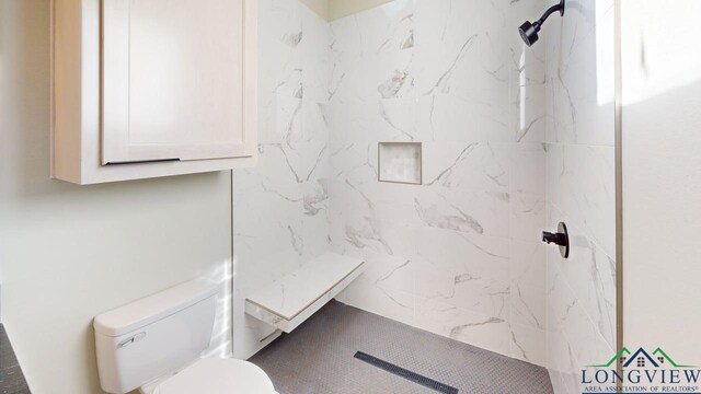 2510 Windmill Ln, Longview, TX 75601 - full bath featuring toilet and a marble finish shower