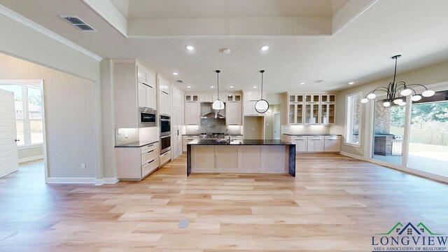 2510 Windmill Ln, Longview, TX 75601 - kitchen featuring dark countertops, recessed lighting, stainless steel appliances, baseboards, and light wood-style floors