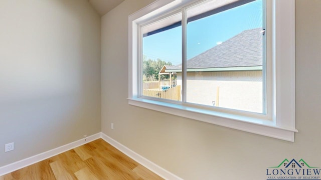 2510 Windmill Ln, Longview, TX 75601 - empty room featuring wood finished floors and baseboards