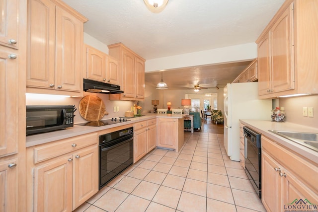 kitchen featuring ceiling fan, black appliances, light brown cabinets, light tile patterned floors, and hanging light fixtures