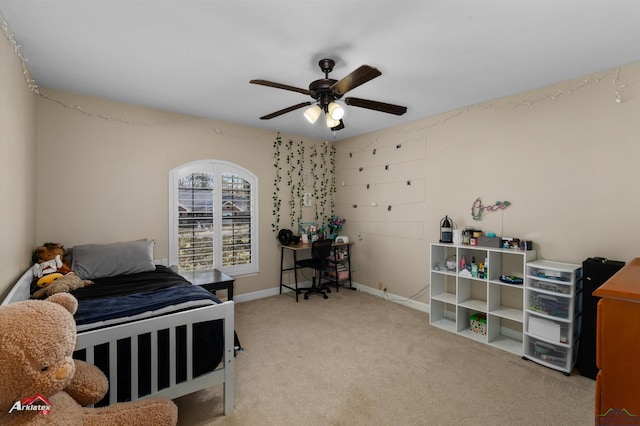 bedroom featuring ceiling fan and light colored carpet