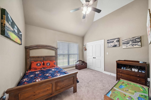 bedroom featuring carpet flooring, high vaulted ceiling, and ceiling fan