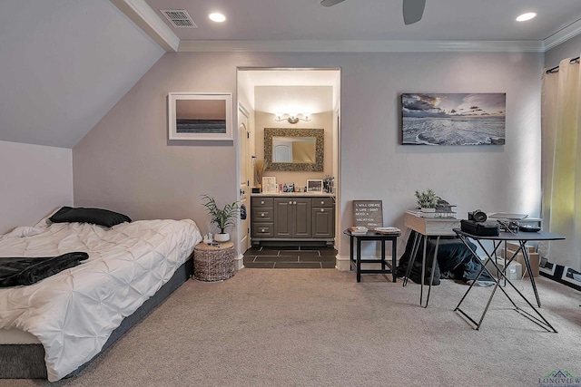 bedroom with connected bathroom, ceiling fan, vaulted ceiling, dark carpet, and ornamental molding