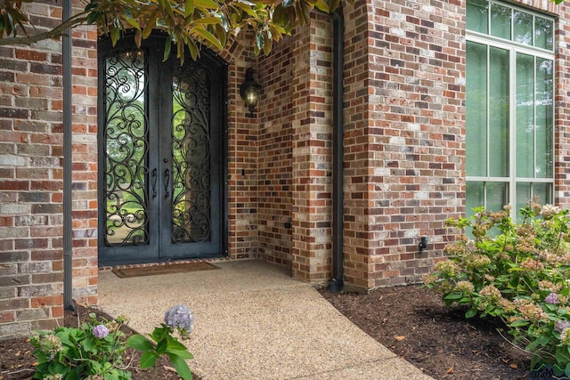 entrance to property featuring french doors