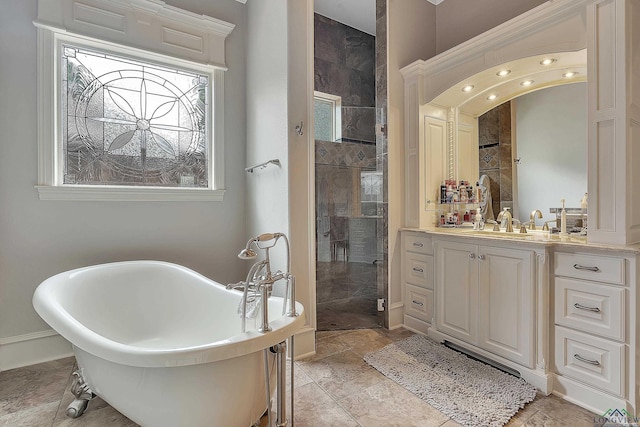 bathroom featuring vanity and separate shower and tub