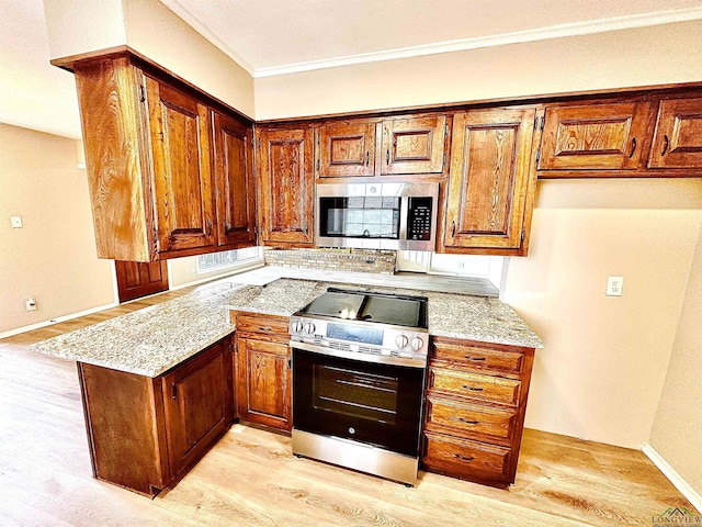 kitchen featuring appliances with stainless steel finishes, ornamental molding, light stone counters, kitchen peninsula, and light hardwood / wood-style flooring