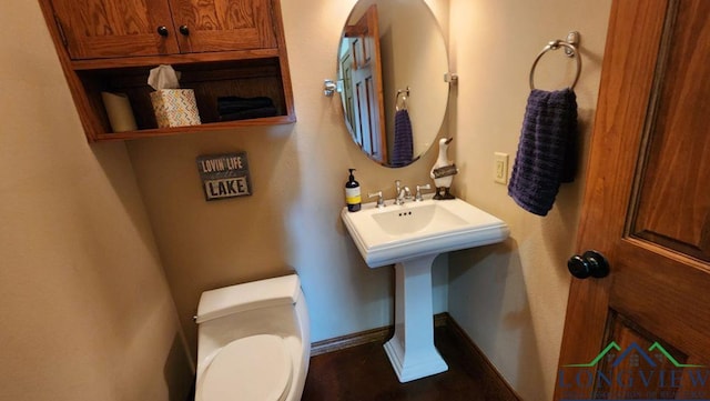 4350 Fm 1650, Gilmer, TX 75645 - half bath with baseboards and toilet
