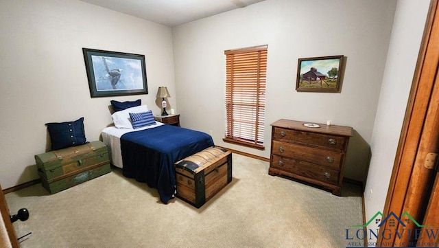 4350 Fm 1650, Gilmer, TX 75645 - bedroom featuring light colored carpet and baseboards