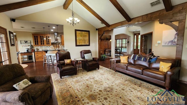 4350 Fm 1650, Gilmer, TX 75645 - living room featuring arched walkways, dark wood-style floors, beamed ceiling, a chandelier, and high vaulted ceiling