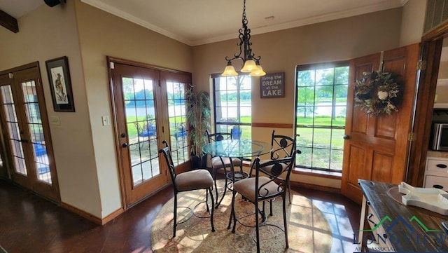 4350 Fm 1650, Gilmer, TX 75645 - dining space featuring french doors, healthy amount of natural light, crown molding, and wood finished floors