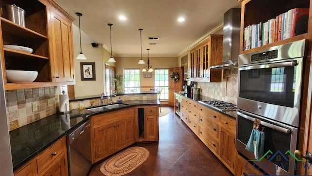 4350 Fm 1650, Gilmer, TX 75645 - kitchen with appliances with stainless steel finishes, wall chimney range hood, crown molding, a peninsula, and backsplash