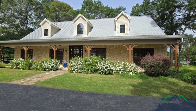 4350 Fm 1650, Gilmer, TX 75645 - view of front of property featuring a porch, stone siding, and a front lawn