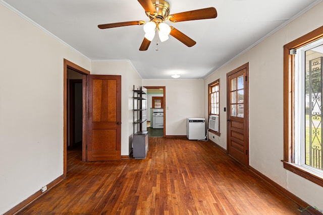 spare room featuring ceiling fan, dark hardwood / wood-style floors, and crown molding