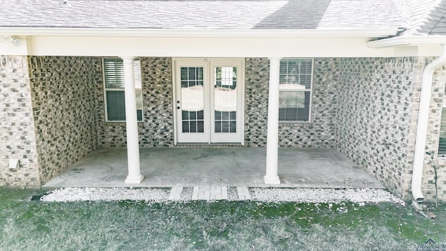 doorway to property with french doors and a patio area