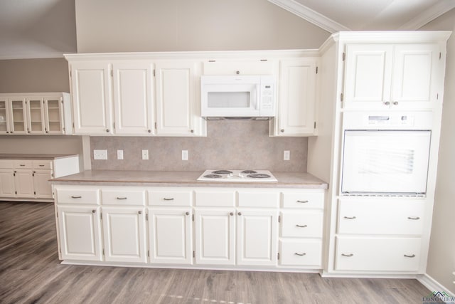 kitchen with white cabinetry, light hardwood / wood-style floors, white appliances, and ornamental molding