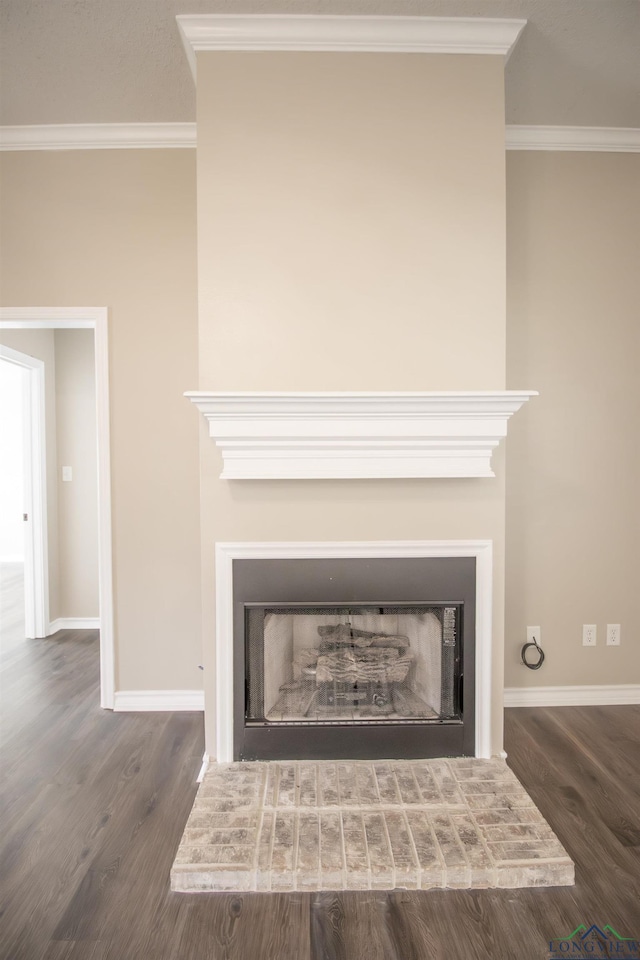 interior details with hardwood / wood-style floors and crown molding