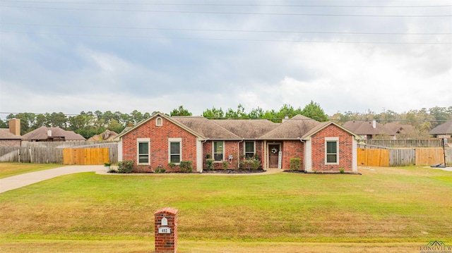 ranch-style house with a front yard