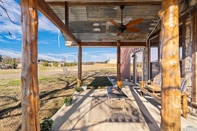 view of patio / terrace featuring ceiling fan