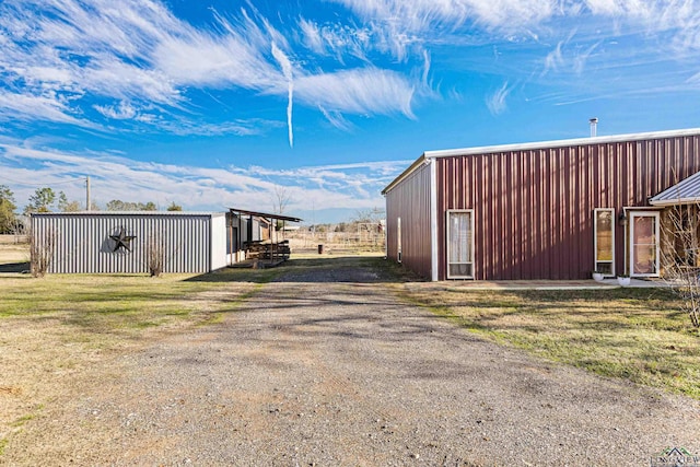 view of outdoor structure with a yard