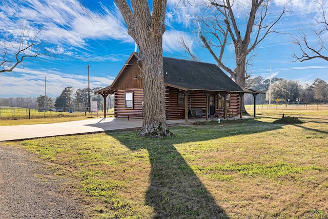 view of home's exterior featuring a lawn