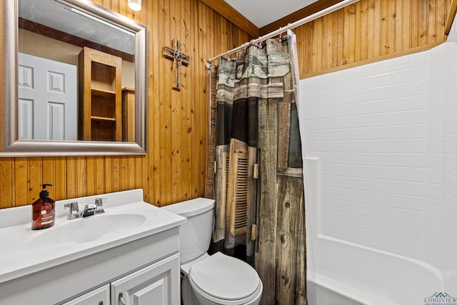 full bathroom featuring toilet, wood walls, shower / bath combination with curtain, and vanity