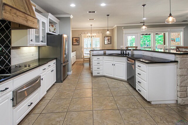 24130 Stallion Park Pl, Lindale, TX 75771 - kitchen featuring custom exhaust hood, a warming drawer, crown molding, visible vents, and appliances with stainless steel finishes