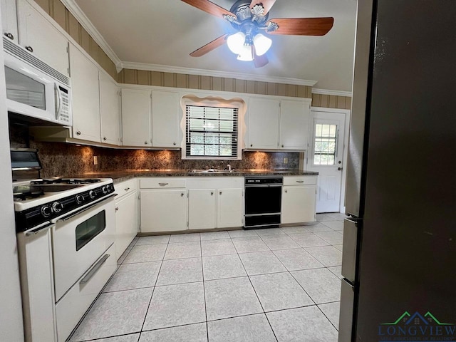 kitchen with white cabinets, ceiling fan, white appliances, and crown molding