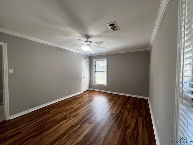 unfurnished room with dark hardwood / wood-style floors, ceiling fan, and crown molding