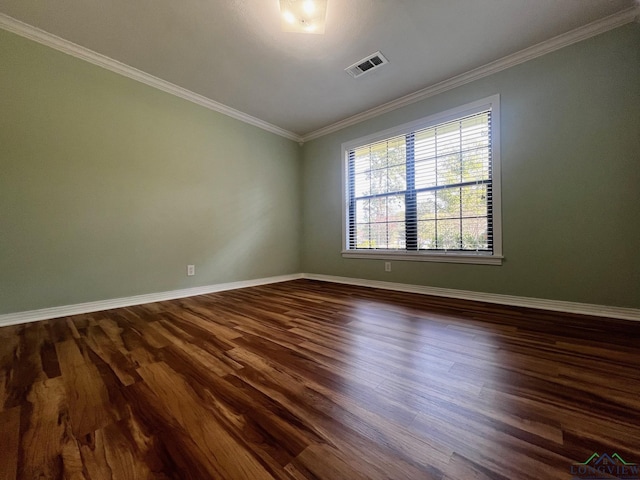 unfurnished room with dark hardwood / wood-style flooring and crown molding