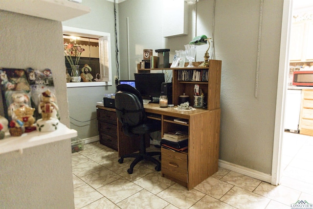 office space with light tile patterned flooring