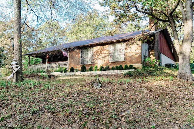 920 Deer Cove Rd, Avinger, TX 75630 - single story home with brick siding