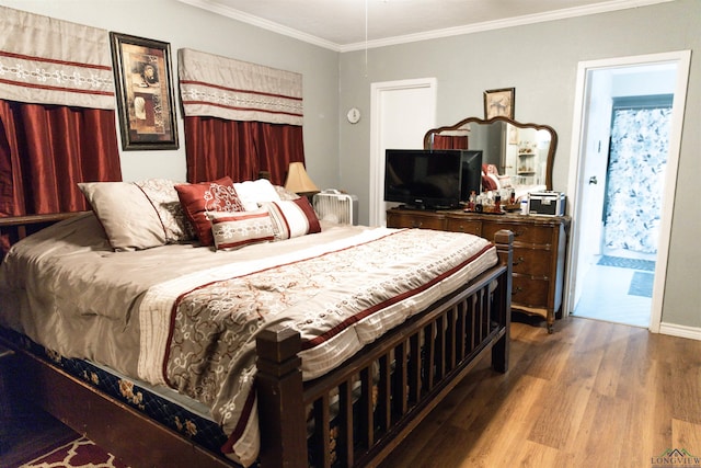 920 Deer Cove Rd, Avinger, TX 75630 - bedroom featuring wood finished floors and ornamental molding