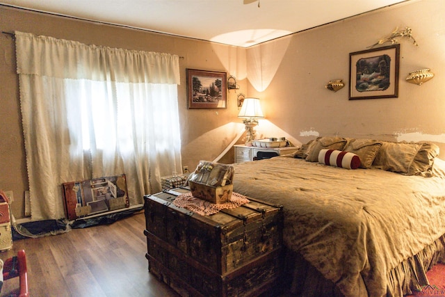 920 Deer Cove Rd, Avinger, TX 75630 - bedroom featuring wood finished floors