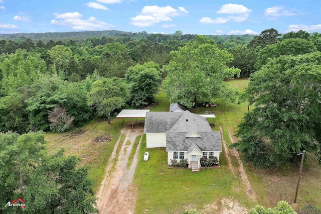drone / aerial view with a forest view