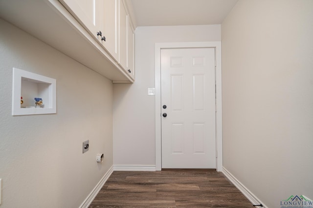 washroom with electric dryer hookup, cabinets, dark wood-type flooring, and hookup for a washing machine