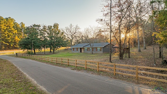 view of front of property with a front lawn