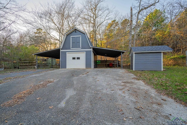 garage featuring a carport