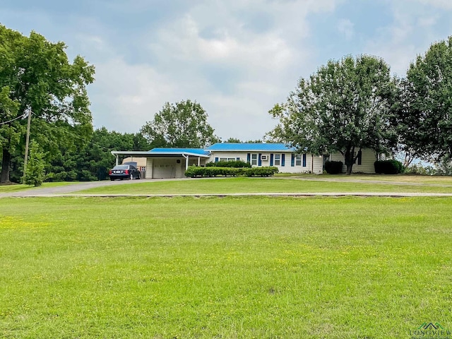 view of property's community with a lawn