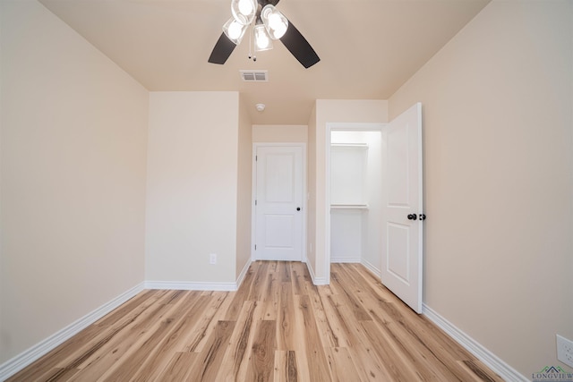 3603 Stracener Rd, Longview, TX 75605 - unfurnished room with light wood-type flooring, ceiling fan, and baseboards