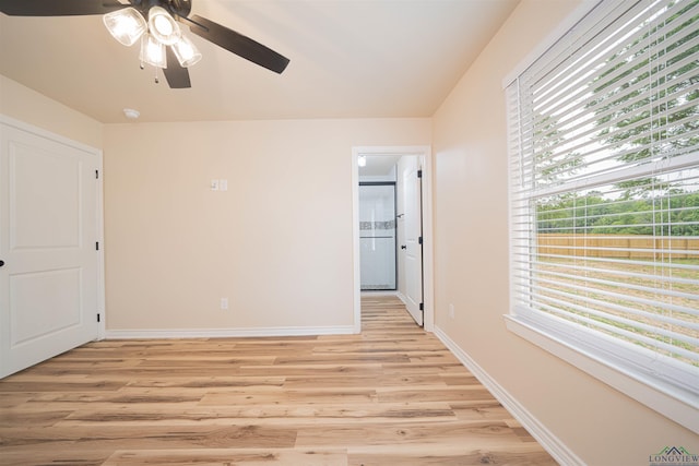 3603 Stracener Rd, Longview, TX 75605 - spare room with light wood finished floors, baseboards, and a ceiling fan