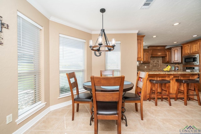 111 Winifreds Way, Hallsville, TX 75650 - dining area featuring ornamental molding, a chandelier, visible vents, and light tile patterned floors