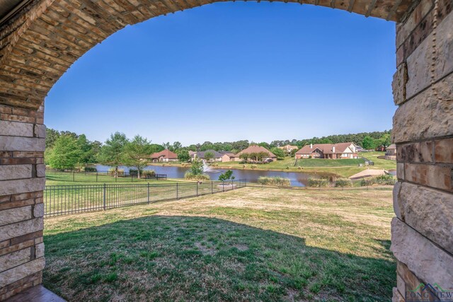 111 Winifreds Way, Hallsville, TX 75650 - view of yard featuring fence, a water view, and a residential view