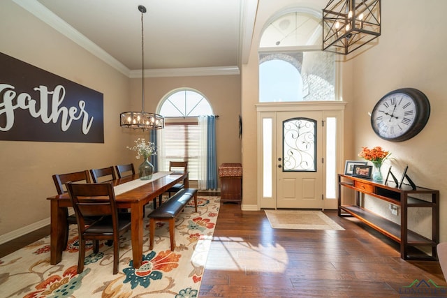 111 Winifreds Way, Hallsville, TX 75650 - dining area featuring an inviting chandelier, ornamental molding, hardwood / wood-style floors, and baseboards