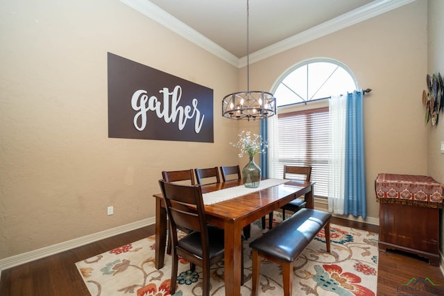 111 Winifreds Way, Hallsville, TX 75650 - dining area featuring wood finished floors, crown molding, baseboards, and an inviting chandelier