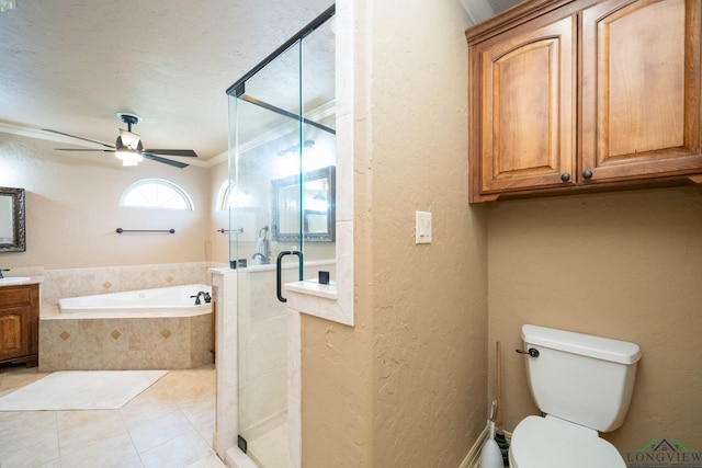 111 Winifreds Way, Hallsville, TX 75650 - bathroom featuring a bath, a textured wall, a shower stall, and ceiling fan