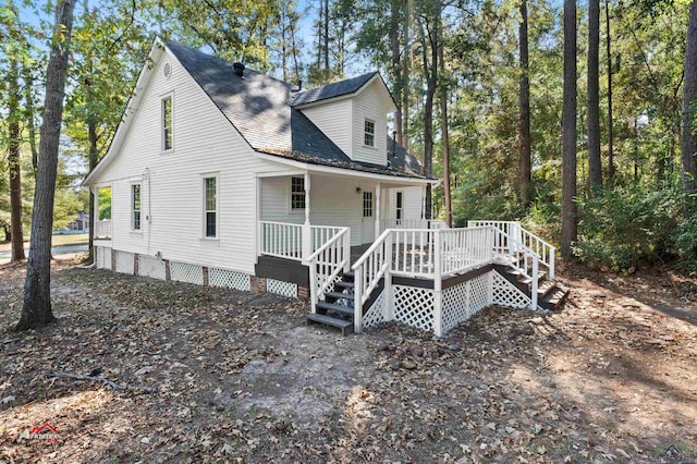 back of house with covered porch